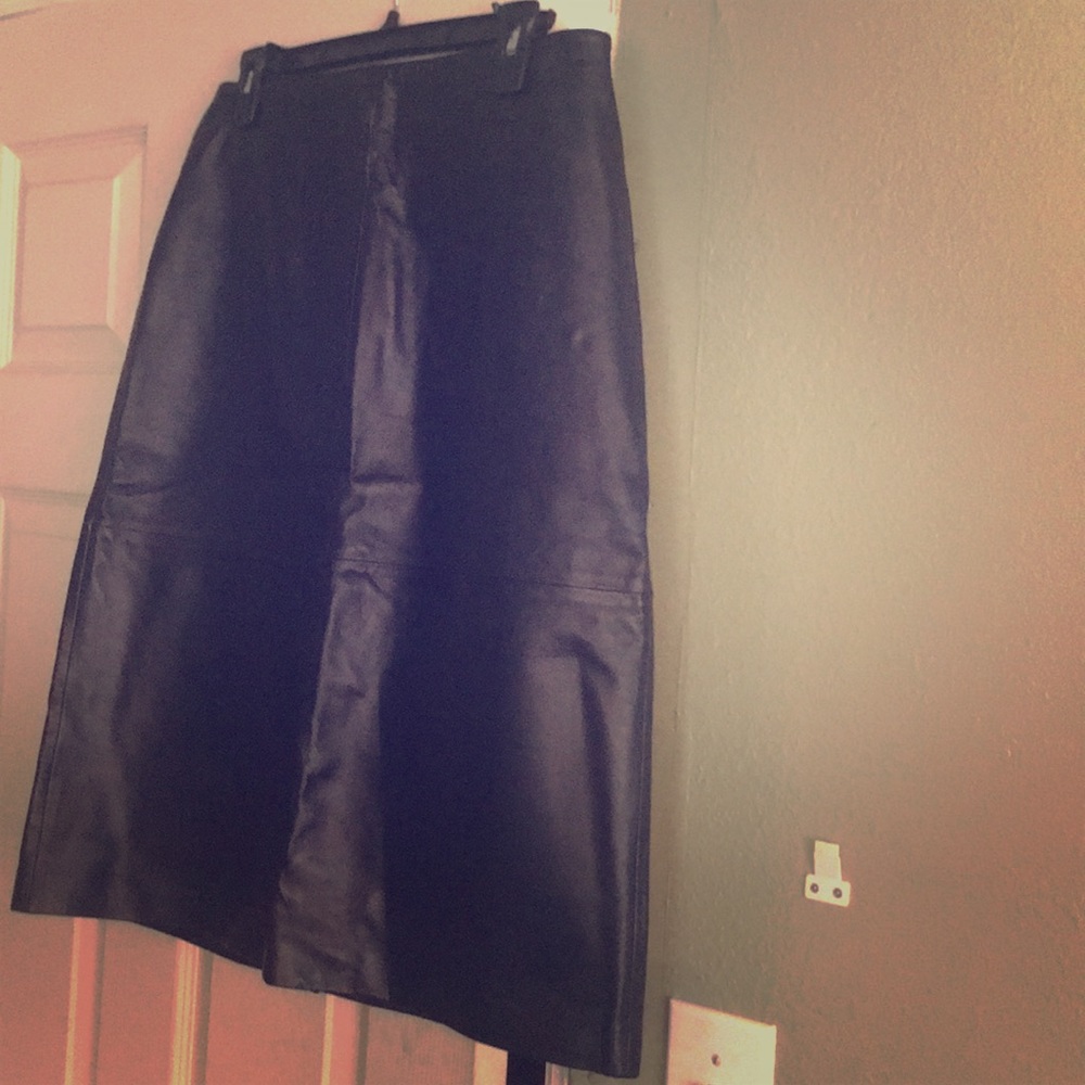 Lambskin black skirt.